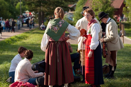 Bingsjo, Sweden - July 3, 2013: The annual traditional folk music festival in Bingsjo held on the first Wednesday in July is one of the most famous in Sweden and attracts thousands of musicians and visitors.のeditorial素材