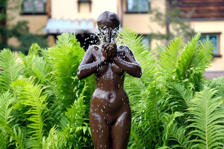 Mora, Sweden - July 3, 2013  Fountain sculpture Morning bath in front of the world famous home of Swedish artist Anders Zorn in Mora, Sweden のeditorial素材