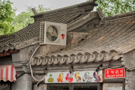 Beijing, China - June 19, 2012 Modern details on a medieval building in the Hutongs of Beijing  The Hutongs provide a glimpse of life in Beijing centuries ago のeditorial素材