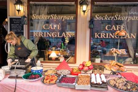 Gothenburg, Sweden - November 17, 2013  A coffee shop serves coffee outdoors in Haga, Gothenburg  Haga is a historic and fashionable residential area that is very popular among tourists のeditorial素材