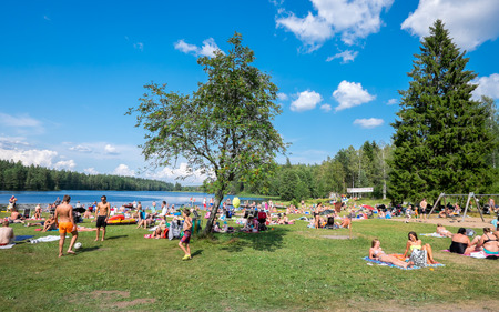 Norrkoping, Sweden  July 26, 2014  People enjoy a hot sunny day by a lake in Norrkoping  July month is turning out to be one of the hottest in Sweden for decades   のeditorial素材