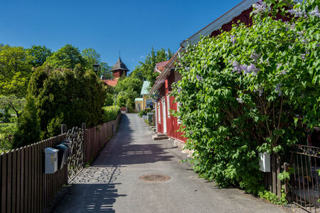 Sigtuna, Sweden  June 2, 2014  Idyllic narrow street in Sigtuna  Founded in 980 Sigtuna is the oldest city in Sweden and a popular tourist destination  Sigtuna belongs to Stockhom County and the province of Uppland のeditorial素材