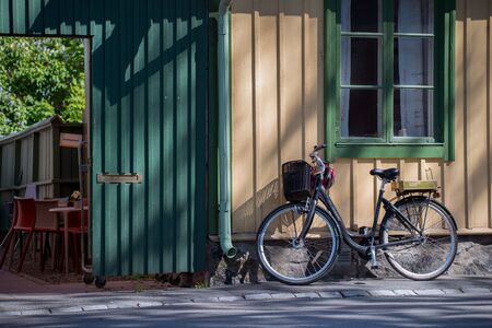 Sigtuna, Sweden  June 2, 2014  Vintage bike parked on the old main street in Sigtuna  Founded in 980 Sigtuna is the oldest city in Sweden  Sigtuna belongs to Stockhom County and the province of Uppland  のeditorial素材