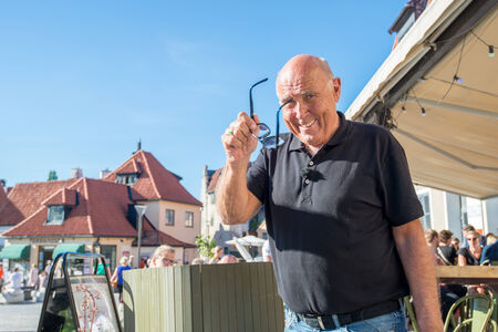 Visby, Sweden - June 10, 2014: Ingvar Oldsberg after recording a TV show in medieval Visby. Ingvar Oldsberg is one is Scandinavias most popular TV personalities.のeditorial素材