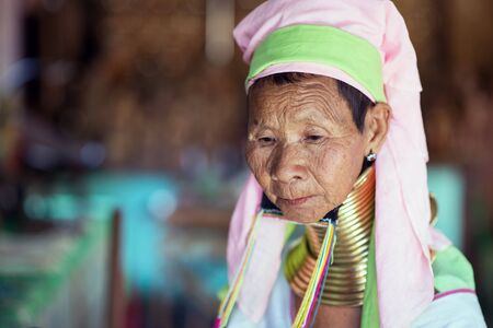 Bagan, Myanmar - February 8, 2014: Portrait of a long neck Kayan woman. Brass coils creating long necks is a tradition of the Kayan Lahwi women.のeditorial素材