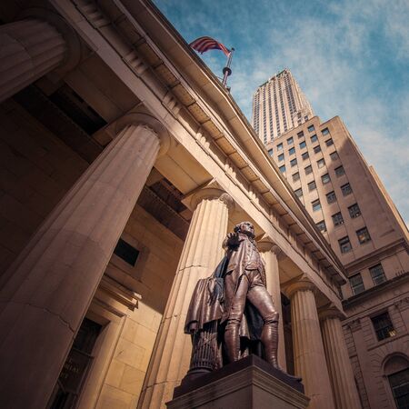 New York, NY, USA - April 25, 2014: Wall Street with Federal Hall National Memorial and the statue of George Washington.のeditorial素材