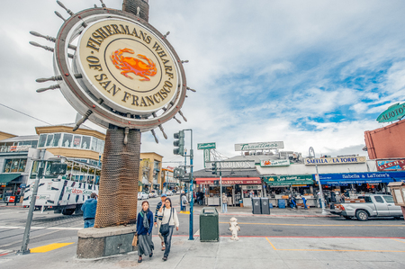 San Francisco, USA  May 3, 2012: People stroll at Fishermanss Wharf in San Francisco. Fishermans Wharf is a popular tourist destination in San Francisco.のeditorial素材