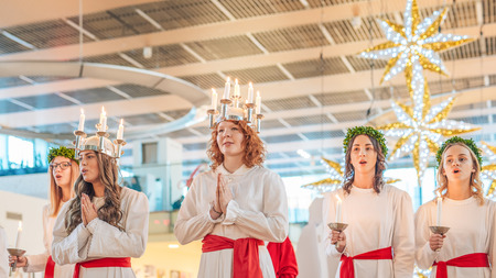 Norrkoping, Sweden - December 13, 2015: Lucia celebration in Norrkoping. The celebration of Lucia or Saint Lucy is one of the dearest traditions in Sweden before Christmas.のeditorial素材