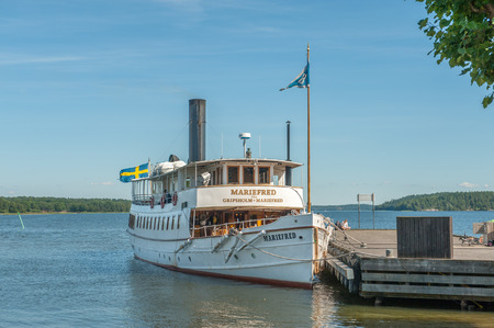 Mariefred, Sweden - August 4, 2011: Vintage steamship ss Mariefred during summer in idyllic small town Mariefred. This historic town on Lake Malaren is a popular tourist destinationのeditorial素材