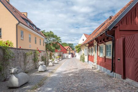 Medieval alley in the historic Hanse town Visby on Swedish Baltic sea island Gotland.の写真素材