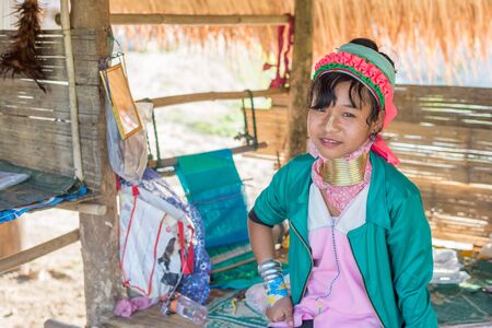 Chiang Rai, Thailand - February 4, 2016: Karen long neck girl in a village between Chiang Rai and Chiang Mai. Karen is one of several ethnic hill tribes in northern Thailandのeditorial素材