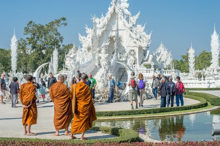 Chiang Rai, Thailand - February 4, 2016: Famous ornate Buddhist monks at Wat Rong Khun (White Temple) in Chiang Rai northern Thailand. This unconventional Buddhist temple is an ongoing project.のeditorial素材