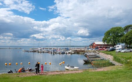 Stora ror, Sweden - July 15, 2017: Stora ror harbor at Kalmar strait on Swedish Baltic sea island Oland. Oland is a popular tourist destination in Sweden during summertime.のeditorial素材