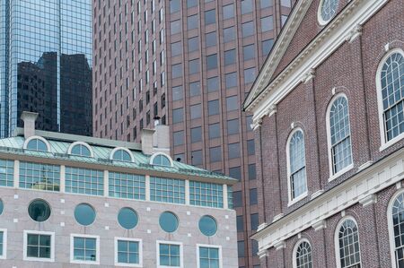 Boston, USA - June 23, 2010: Old and modern architecture in Boston. Faneuil Hall in the foreground was built in 1743 and is one of the most visited tourist sites in USA.のeditorial素材