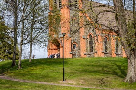 Ãtvidaberg, Sweden - May 13, 2017: Ãtvid big church on a sunny spring day in Ãtvidaberg. The church dates back to 1885.のeditorial素材