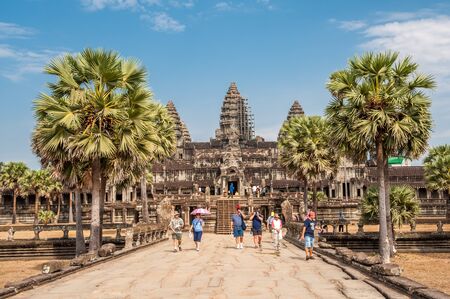 Siem Reap, Cambodia - March 10, 2009: Tourists at Angkor Wat in Siem Reap, Cambodia. Angkor Wat is a 12th century temple.のeditorial素材
