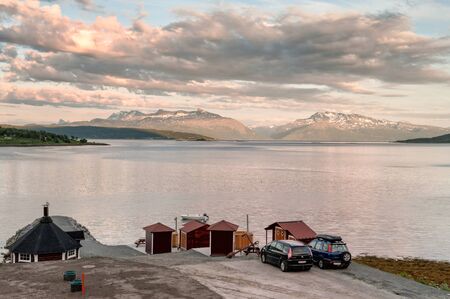 Bjerkvik, Norway - July 3, 2011: View from Bjerkvik during a Nordic summer night towards Ofotfjord and Narvik. This fjord was the scene for several naval battles during World War II.のeditorial素材