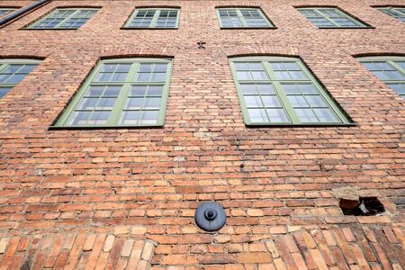 Brick wall in the old industrial landscape of Norrkoping. Norrkoping is a historic industrial town in Sweden.の写真素材