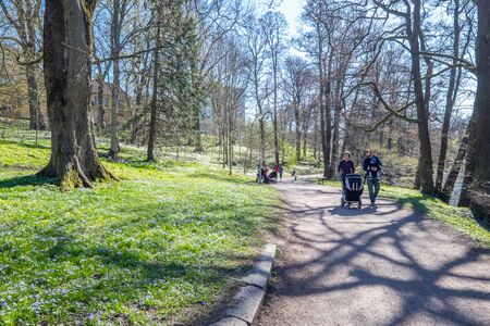 NorrkÃ¶ping, Sweden - April 21, 2015: Spring atmosphere along Motala river in Norrkoping. Norrkoping is a historic industrial town in Sweden.のeditorial素材