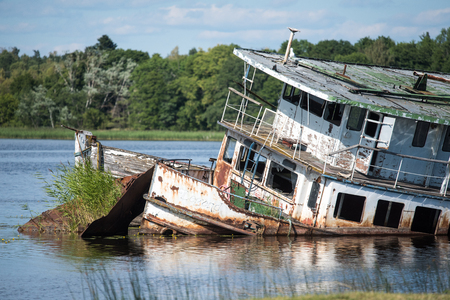 Old abandoned shipwreck at Karlsro harbor in Norrkoping, Swedenの写真素材