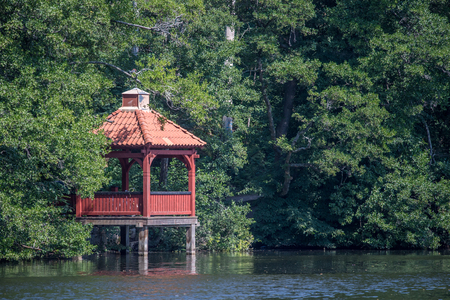 Sunny summer day in the city park along Motala river in Norrkoping. Norrkoping is a historic industrial town in Sweden.の写真素材
