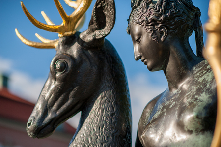 Stockholm, Sweden - August 4, 2012: Public sculpture at Diplomatstaden in Stockholm of Diana the goddess of hunt resting. This is one of two copies in Sweden of a historic artwork by Jean Goujon which French king Henry II donated to Diane de Poitiers.のeditorial素材