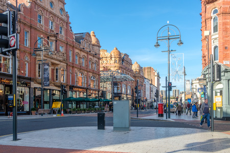 Leeds, England - October 24, 2018: Leeds Victorian and Edwardian Shopping Arcades (left) in the city...