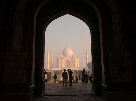 Agra, India - February 5, 2011: Entrance gate to Taj Mahal in Agra. Taj Mahal is a tomb for Mughal emperor Shah Jahans wife Mumtaz Mahal. It is the best example of Mughal architecture and a UNESCO World Heritage site.のeditorial素材