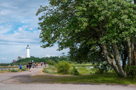 Byxelkrok, Sweden - July 3, 2021: Lighthouse Tall Erik on the northern point of Swedish Baltic Sea island Oland. The island is a popular tourist destination known as the island of sun and wind.のeditorial素材