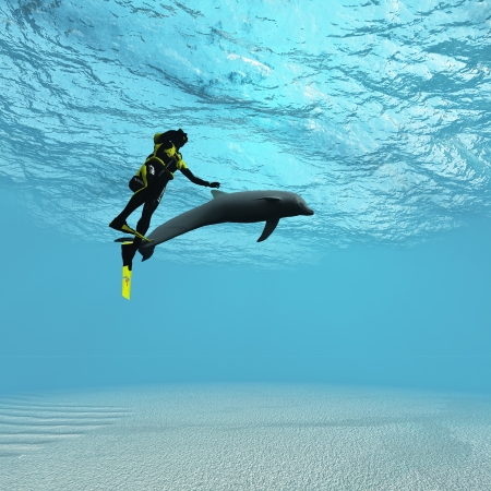 Diver with dolphinの写真素材