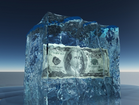 One hundred dollar bill frozen in iceの写真素材
