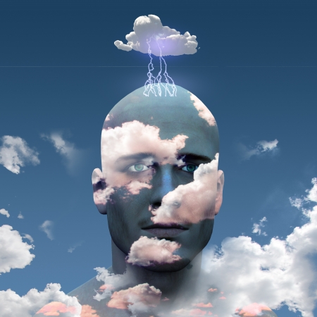 Mans head in cloudsの写真素材