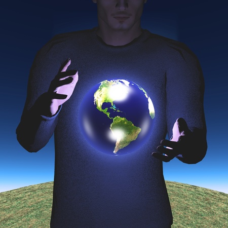 Earth hovers between mans handsの写真素材