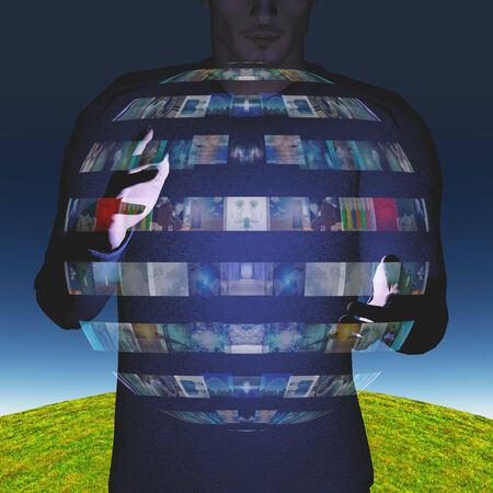 Man intereacts with video sphere displayの写真素材