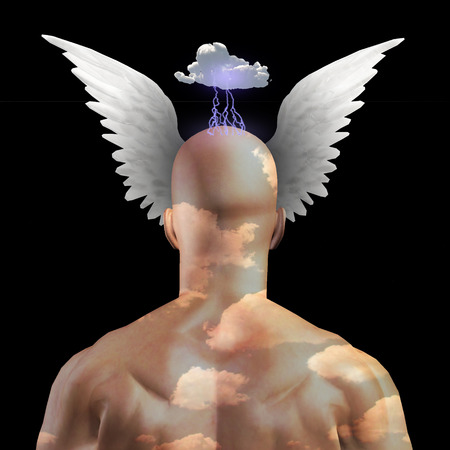 Wings and clouds upon headの写真素材