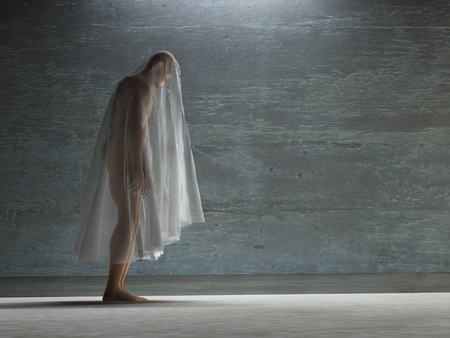 Figure hunched over under transparent clothの写真素材