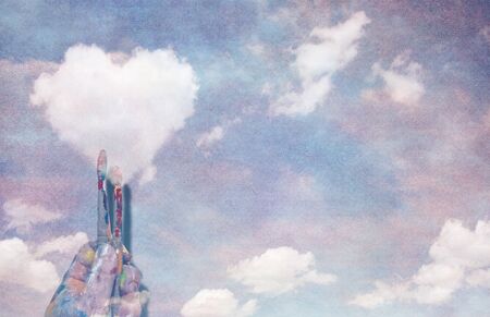 Heart cloud and paint brushesの写真素材