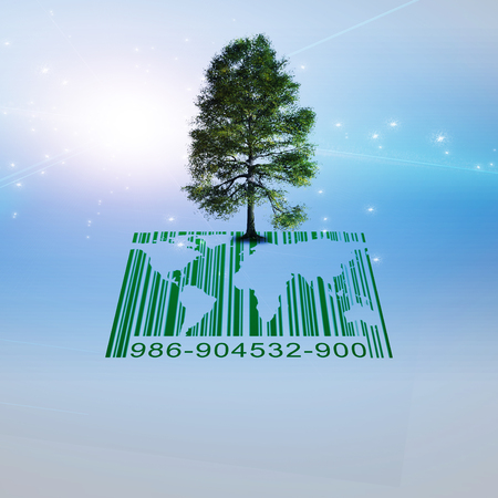 Green tree on a barcode and world map.の写真素材