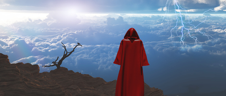 Figure in red cloak meets sunrise.の写真素材