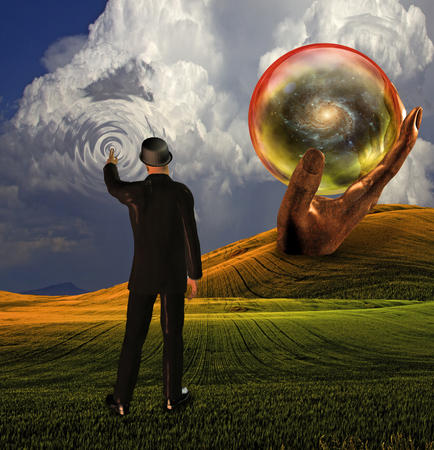 Man in suit touches sky creating ripples with galaxy revealed in sphereの写真素材