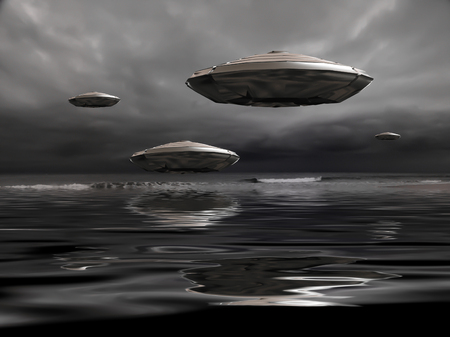 Flying saucers over the ocean.の写真素材