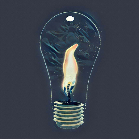 Surrealism. Light bulb with candle light inside.の写真素材
