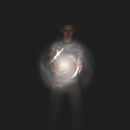 Woman controls galaxy between her handsの写真素材