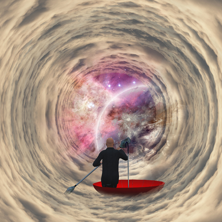 Business man in red umbrella floating in the tunnel of clouds to the spaceの写真素材