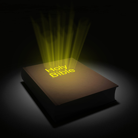 Holy Bible. Book with glowing wordsの写真素材