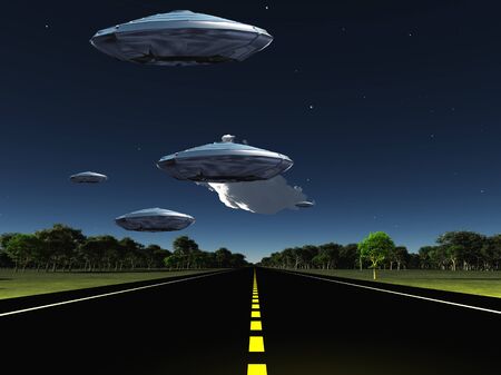 Flying saucers over the highway. Space travelersの写真素材