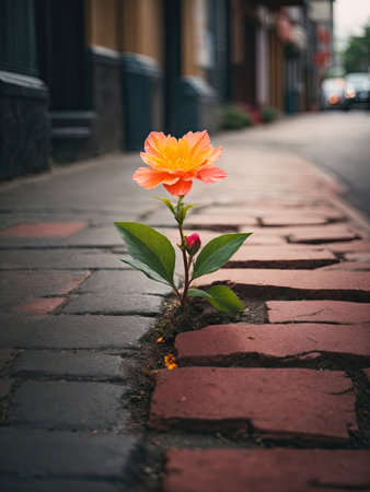 Beautiful flower growing out of crack in a sidewalk. AI generatedの素材