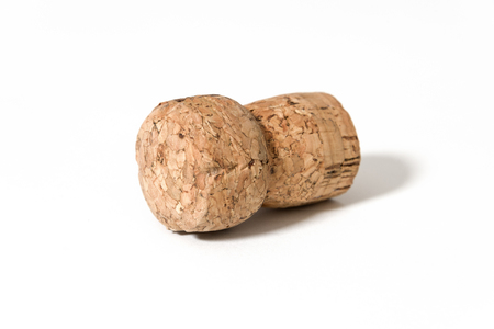 Cork from champagne wine bottle - concept isolated on white background with copy spaceの写真素材