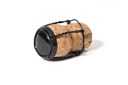 Cork from champagne wine and muselet holding wire - concept isolated on white background with copy spaceの写真素材