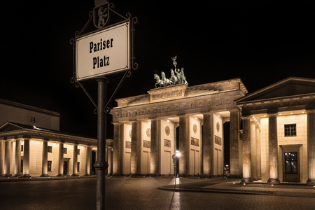 Germany, Berlin, Pariser Platz: Detail of illuminated Brandenburg Gate (Brandenburger Tor) at night in the middle of the German capital. The monument was built by king Frederick William II.のeditorial素材